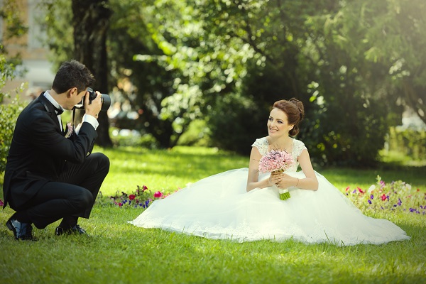 Bride being photographed