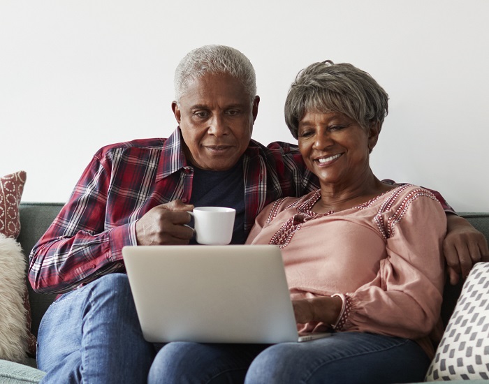 Man and woman with laptop