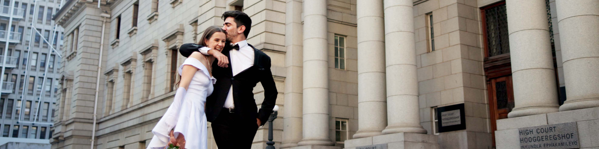 Married couple walking and celebrating