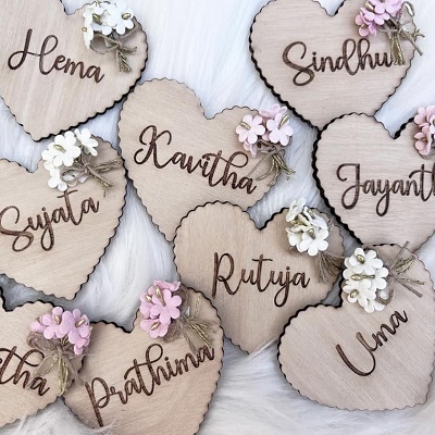Wooden hearts carved with names