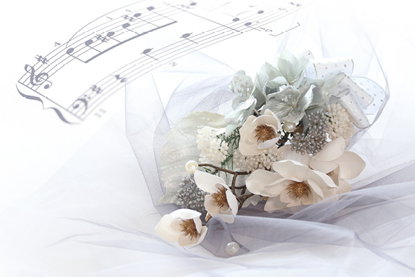 Real flowers on a music sheet
