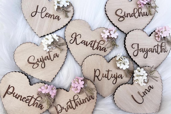 Wooden place names in the shape of hearts